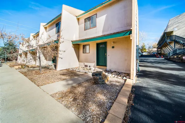 a view of a house with a street