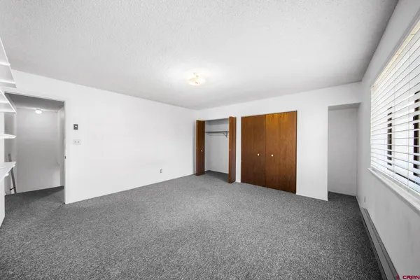 a view of a city with an ocean