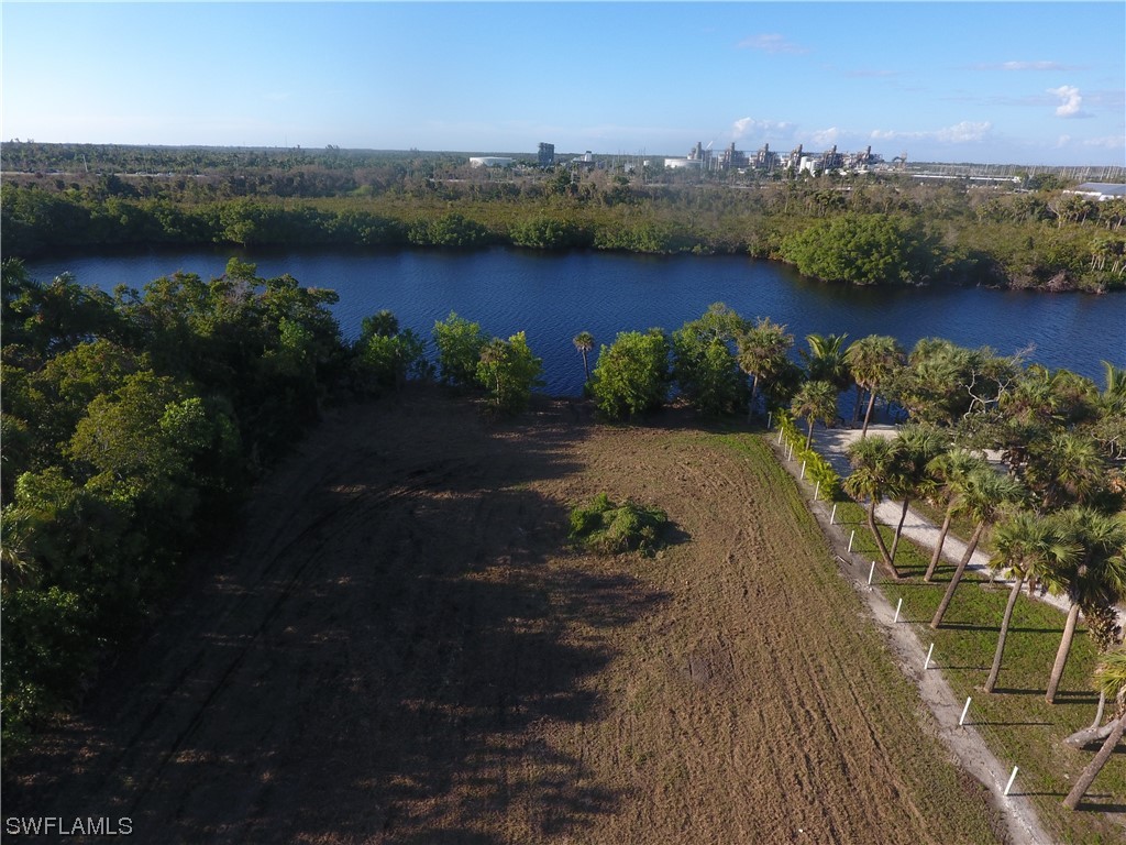 3860 Ellis Road Fort Myers, FL 33905 - Photo 17 of 18 an aerial view of a houses with ocean view