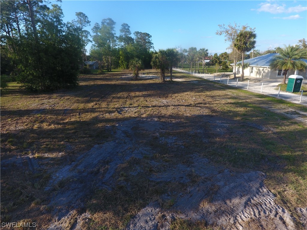 3860 Ellis Road Fort Myers, FL 33905 - Photo 18 of 18 a view of a yard with an outdoor space
