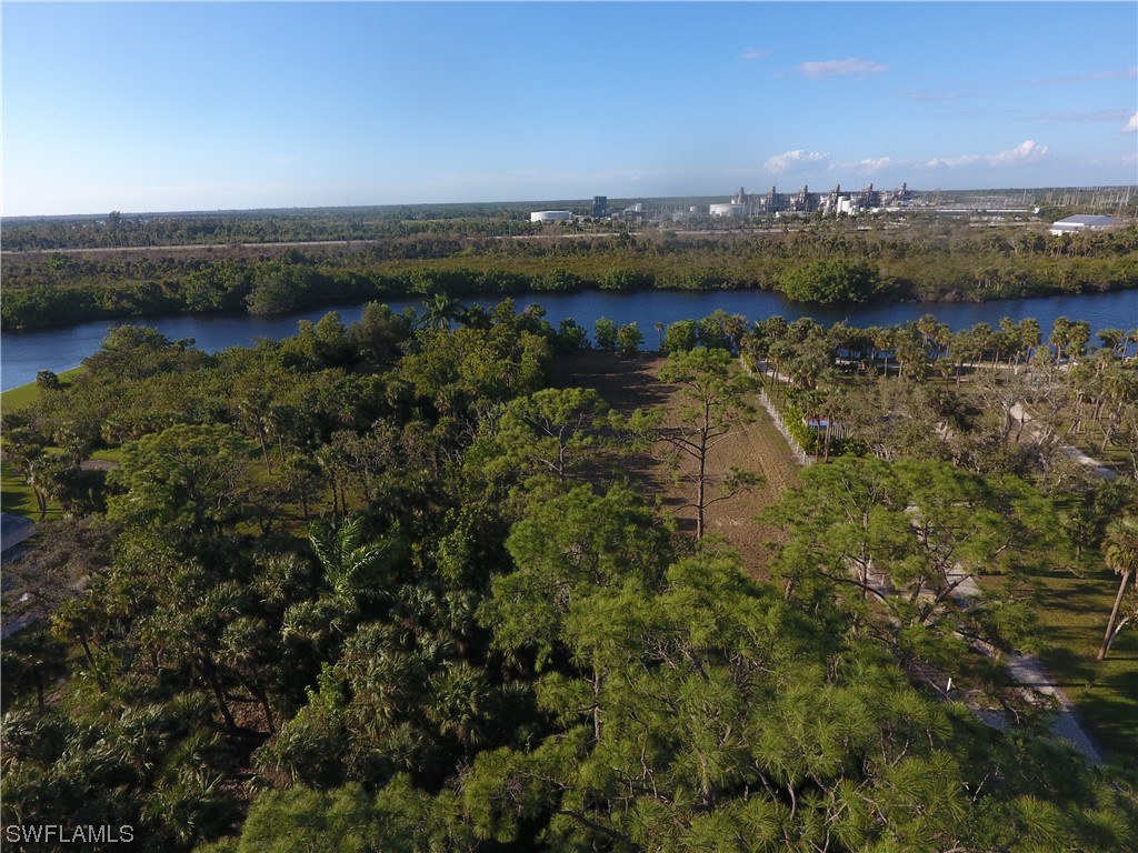3860 Ellis Road Fort Myers, FL 33905 - Photo 6 of 18 an aerial view of mountain with lake view