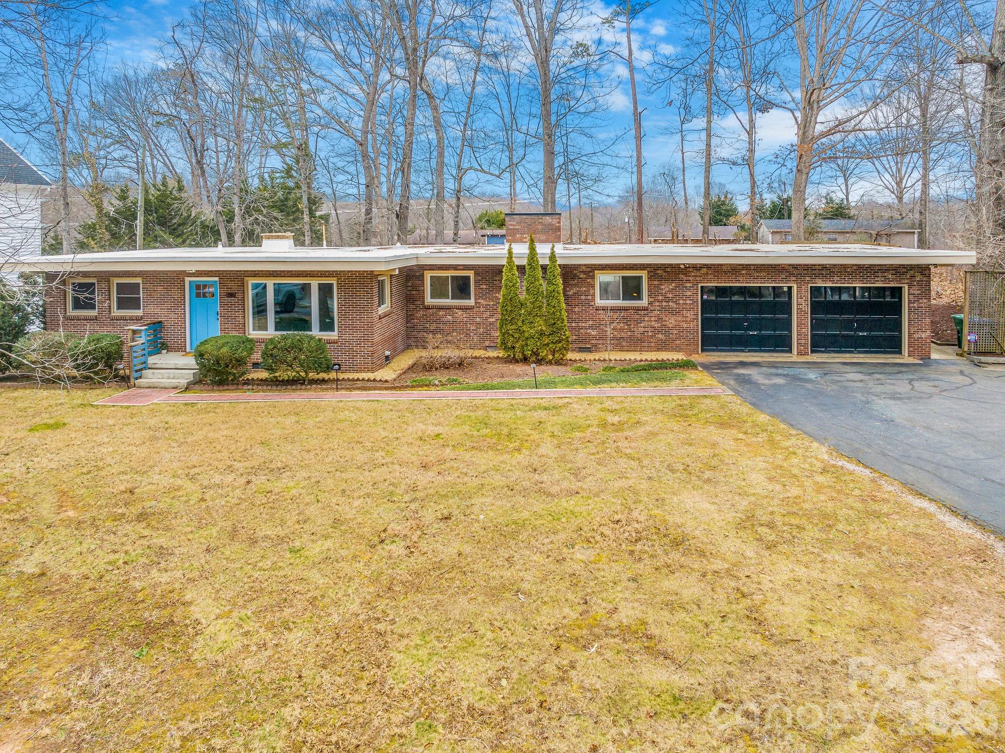 a front view of a building with a swimming pool