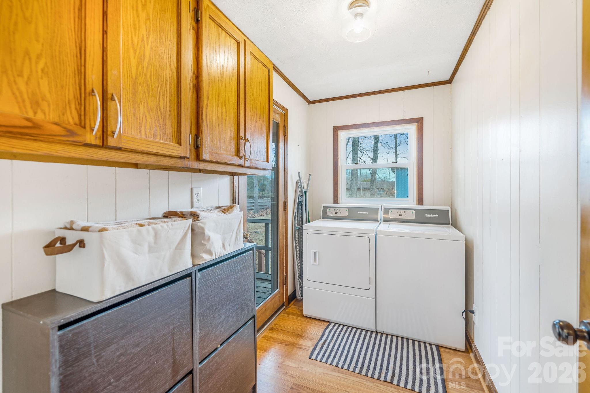 96 Oak Hill Road Candler, NC 28715 - Photo 23 of 41 a bathroom with a sink and a window