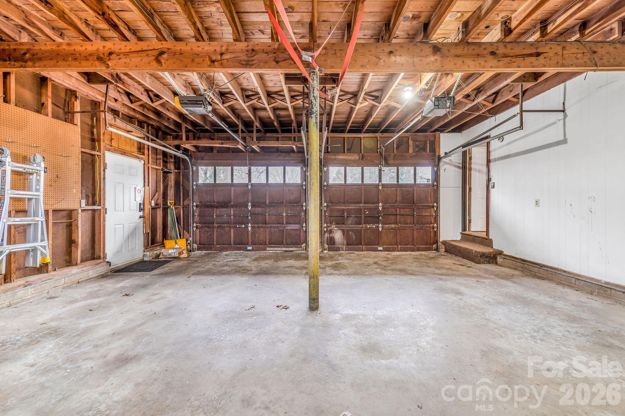 96 Oak Hill Road Candler, NC 28715 - Photo 25 of 41 a view of empty room with wooden floor