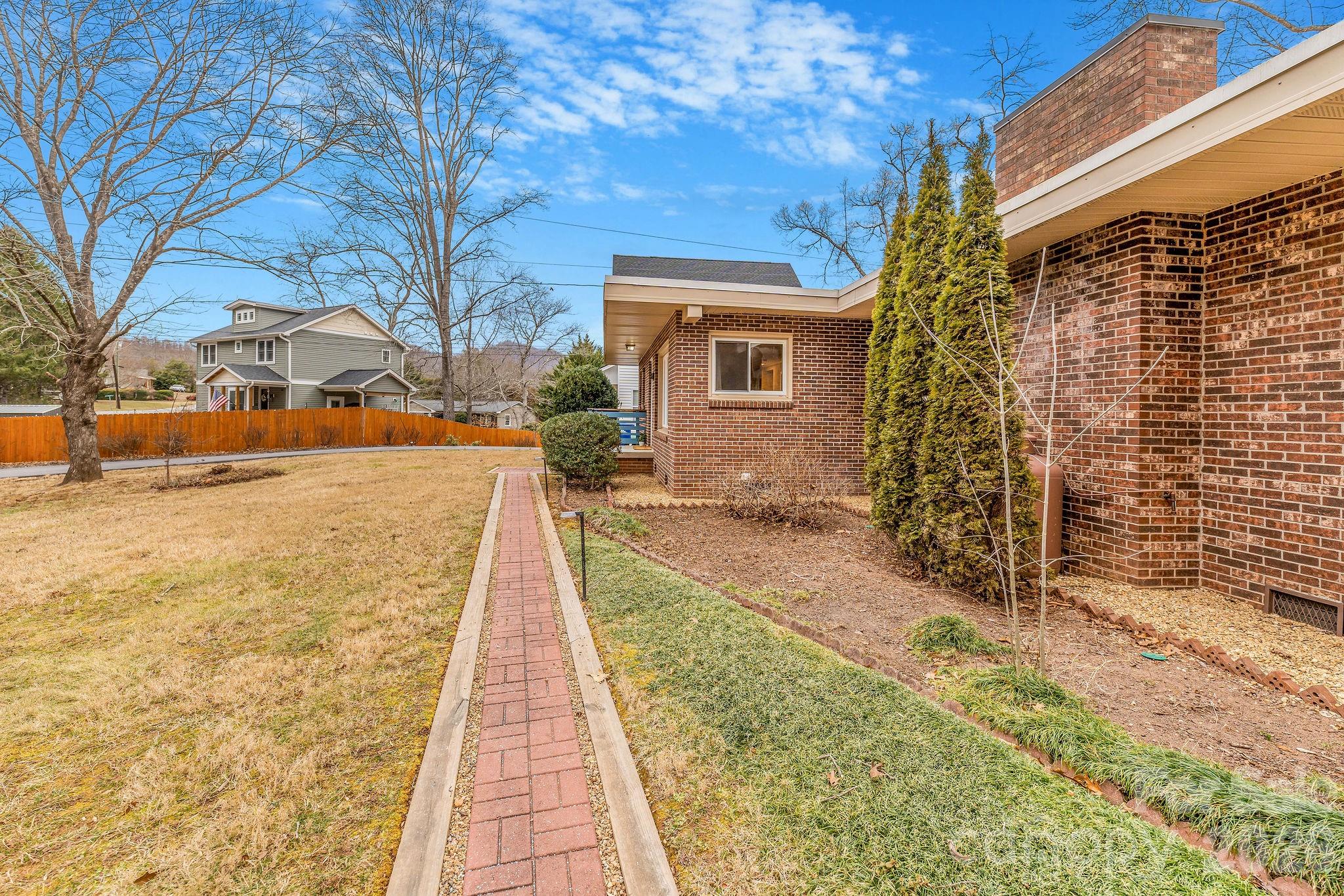 96 Oak Hill Road Candler, NC 28715 - Photo 38 of 41 a view of a pathway with a yard