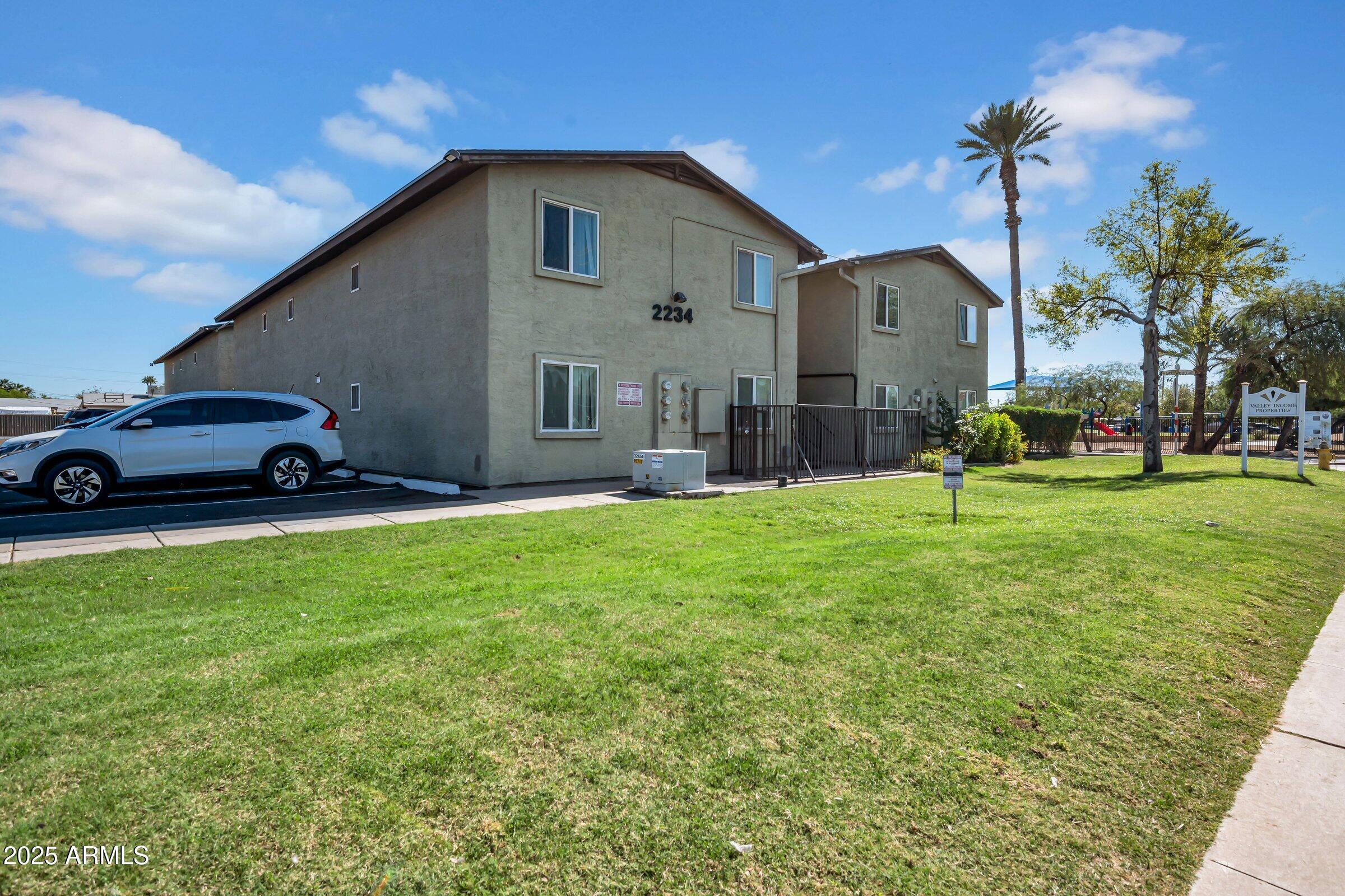 2234 West Hazelwood Street Phoenix, AZ 85015 - Photo 1 of 22 a front view of house with yard and outdoor seating