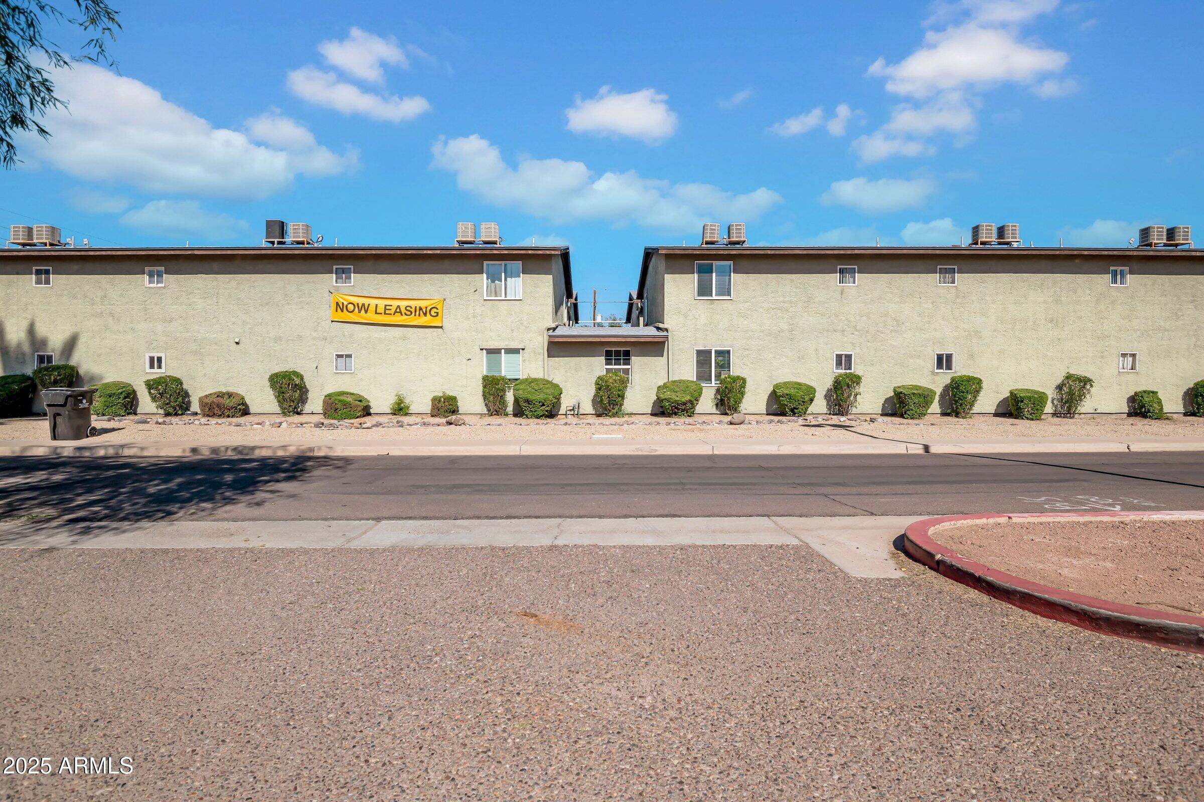2234 West Hazelwood Street Phoenix, AZ 85015 - Photo 4 of 22 view of a street with an outdoor seating