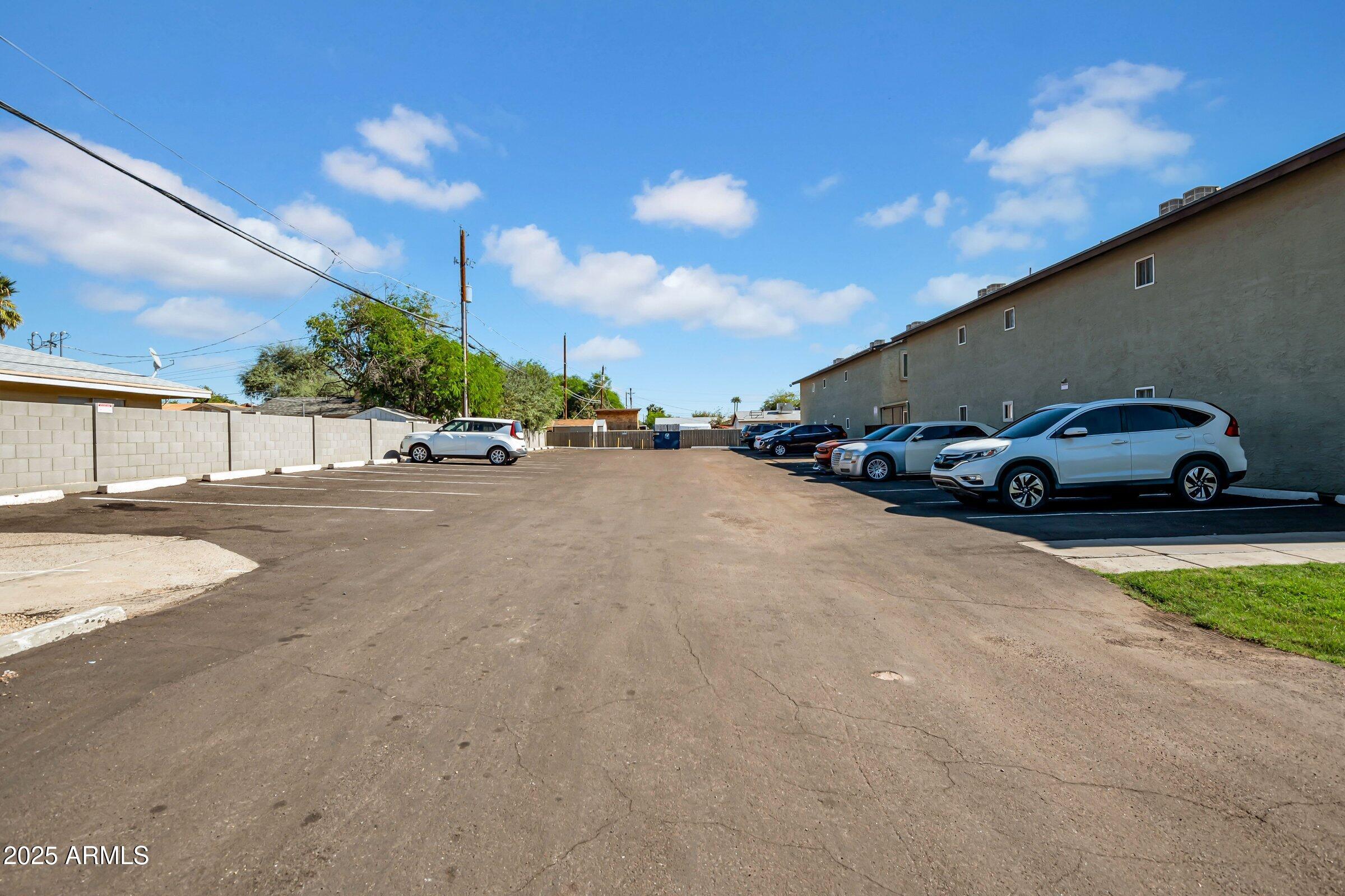 2234 West Hazelwood Street Phoenix, AZ 85015 - Photo 7 of 22 a car parked on the side of the road