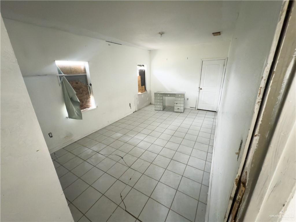 5909 Kountry Loop Mission, TX 78574 - Photo 18 of 23 a view of a livingroom with wooden floor