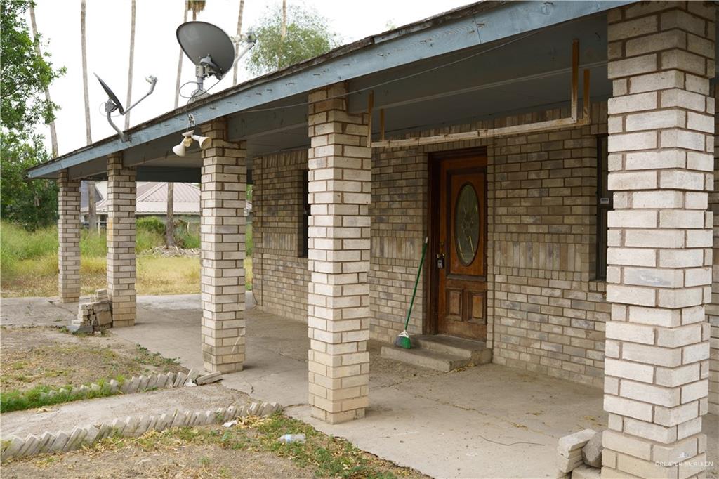 5909 Kountry Loop Mission, TX 78574 - Photo 4 of 23 a front view of a house with a porch