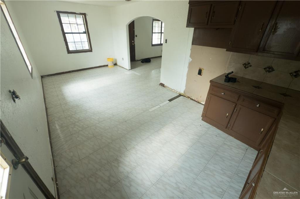 5909 Kountry Loop Mission, TX 78574 - Photo 10 of 23 hallway with window and fireplace