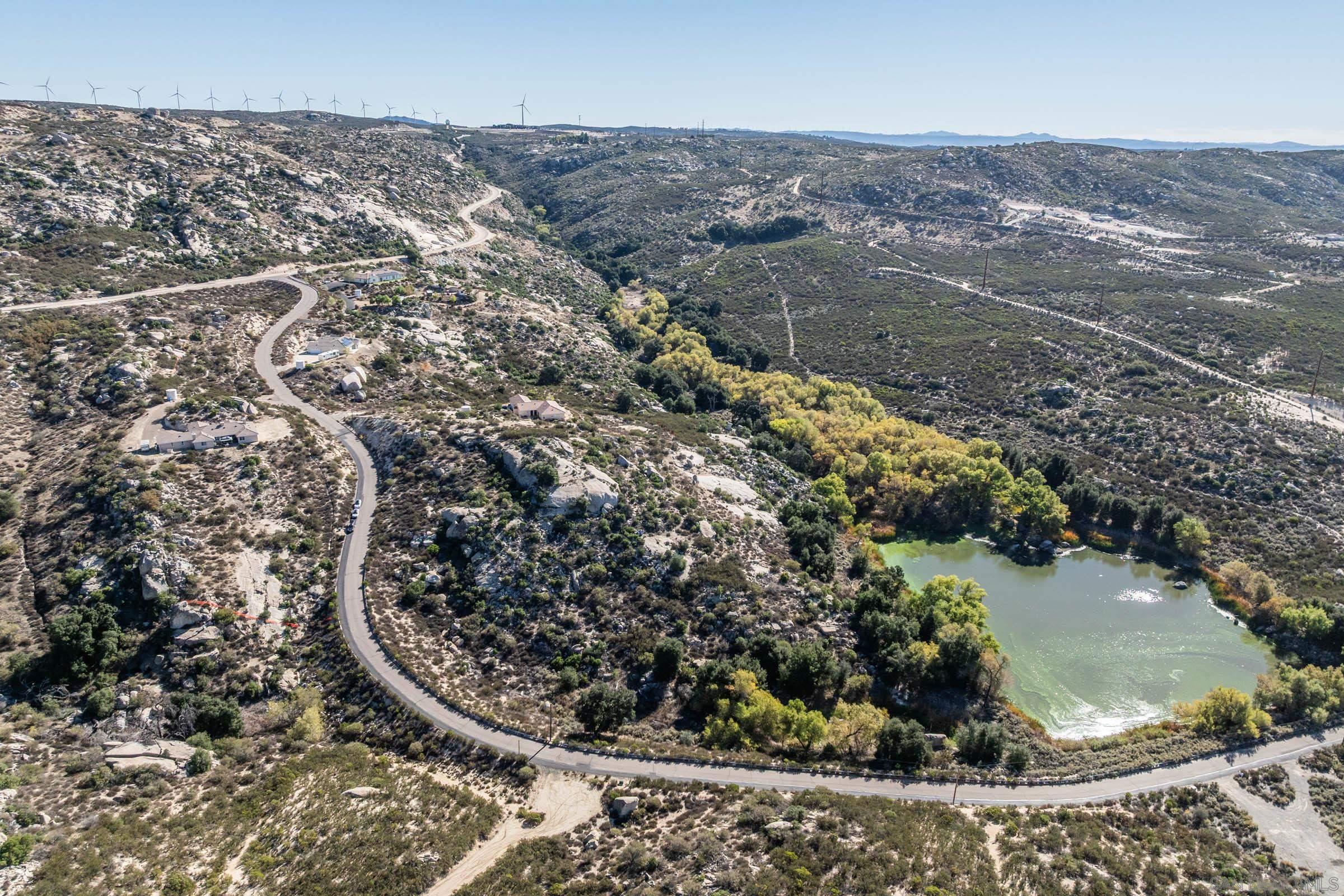 35546 Stagecoach Springs Road Pine Valley, CA 91962 - Photo 4 of 22 a view of a house with a yard and mountains