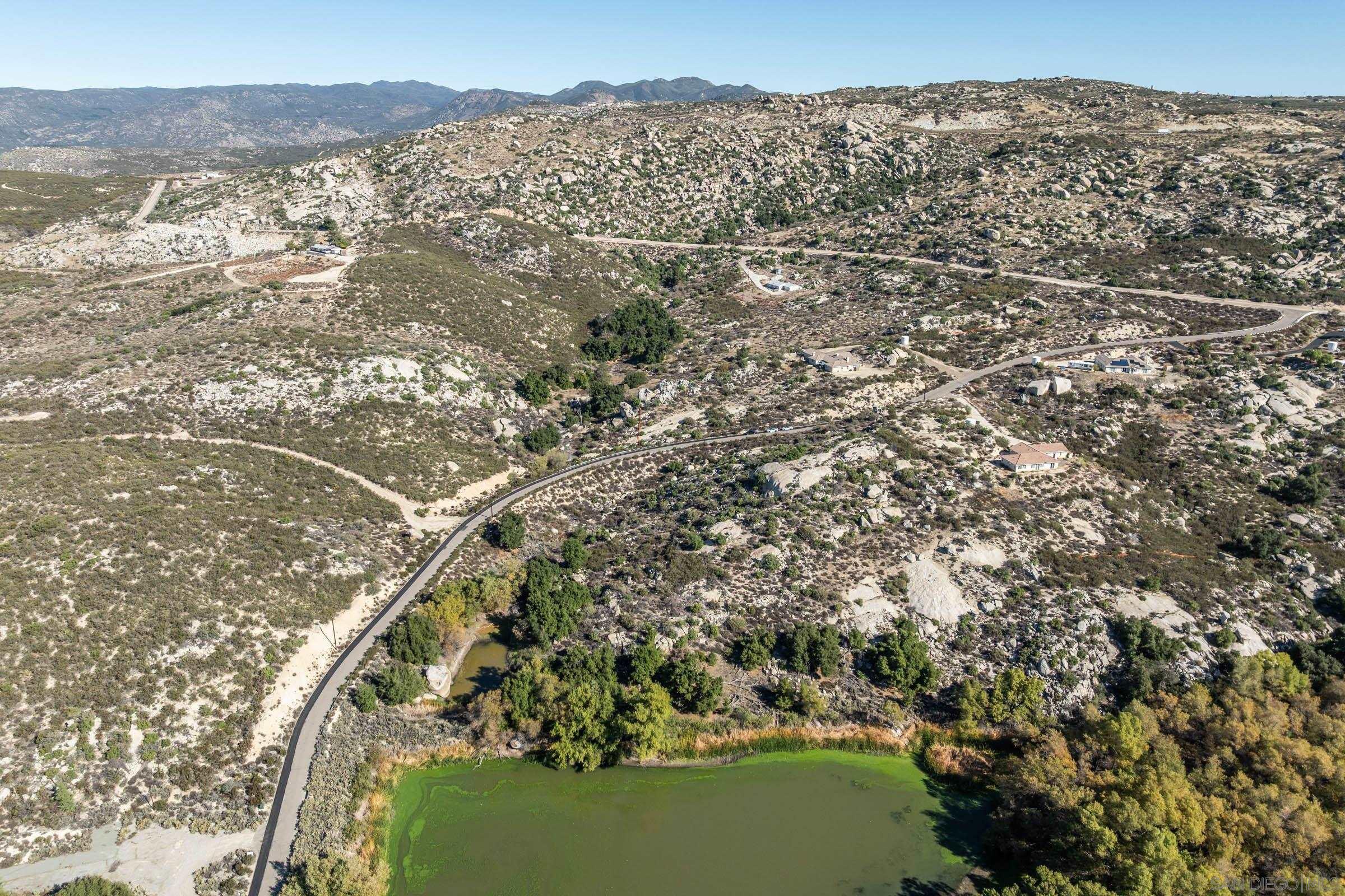 35546 Stagecoach Springs Road Pine Valley, CA 91962 - Photo 6 of 22 a view of a forest with a lake