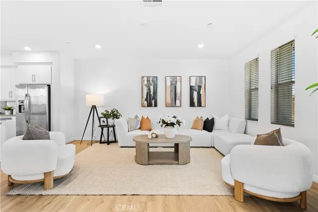 a living room with furniture and a table
