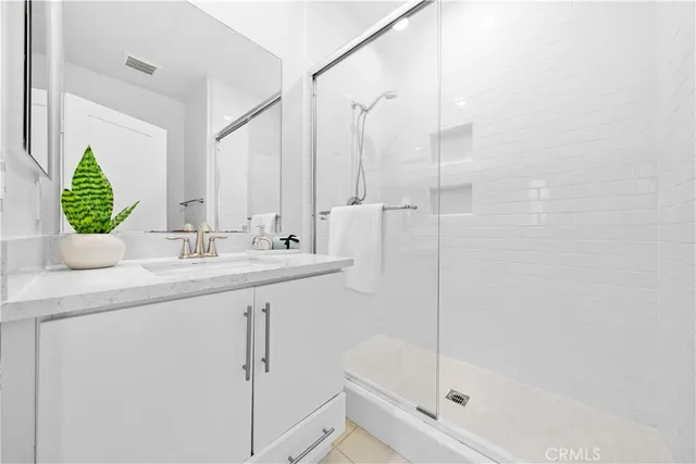 a utility room with sink dryer and washer