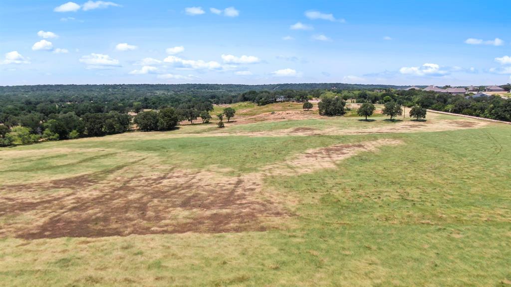 600 Wilson Bend Road Millsap, TX 76066 - Photo 26 of 28 a view of a lake from a yard