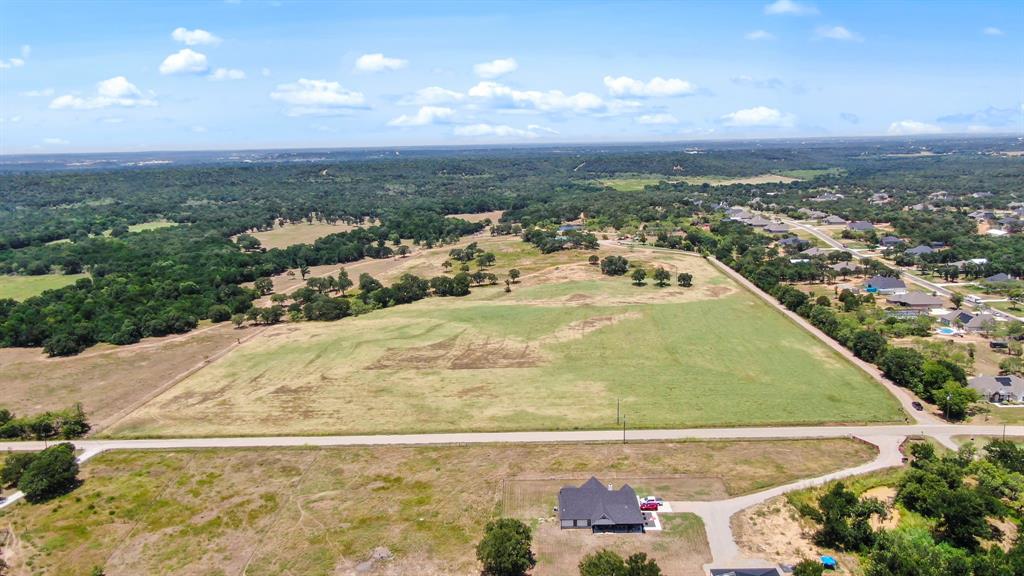 600 Wilson Bend Road Millsap, TX 76066 - Photo 8 of 28 an aerial view of residential houses with outdoor space