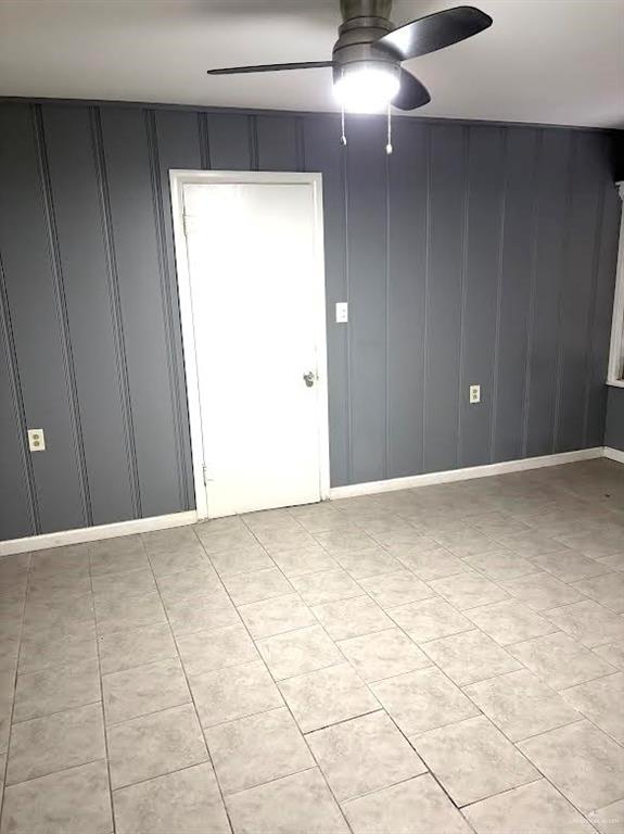 1317 South B Street Harlingen, TX 78550 - Photo 5 of 10 a view of an empty room and window