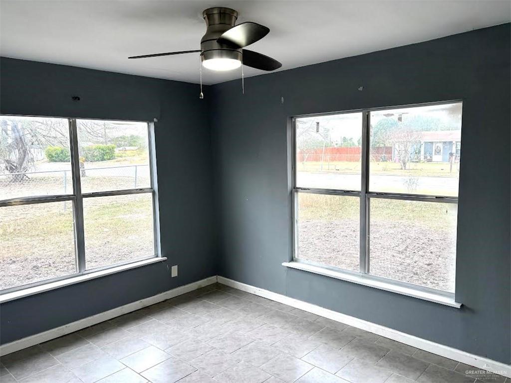 1317 South B Street Harlingen, TX 78550 - Photo 8 of 10 a view of an empty room with a window