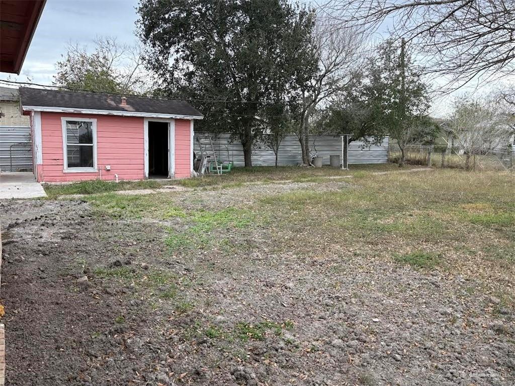 1317 South B Street Harlingen, TX 78550 - Photo 9 of 10 a view of outdoor space with deck and backyard
