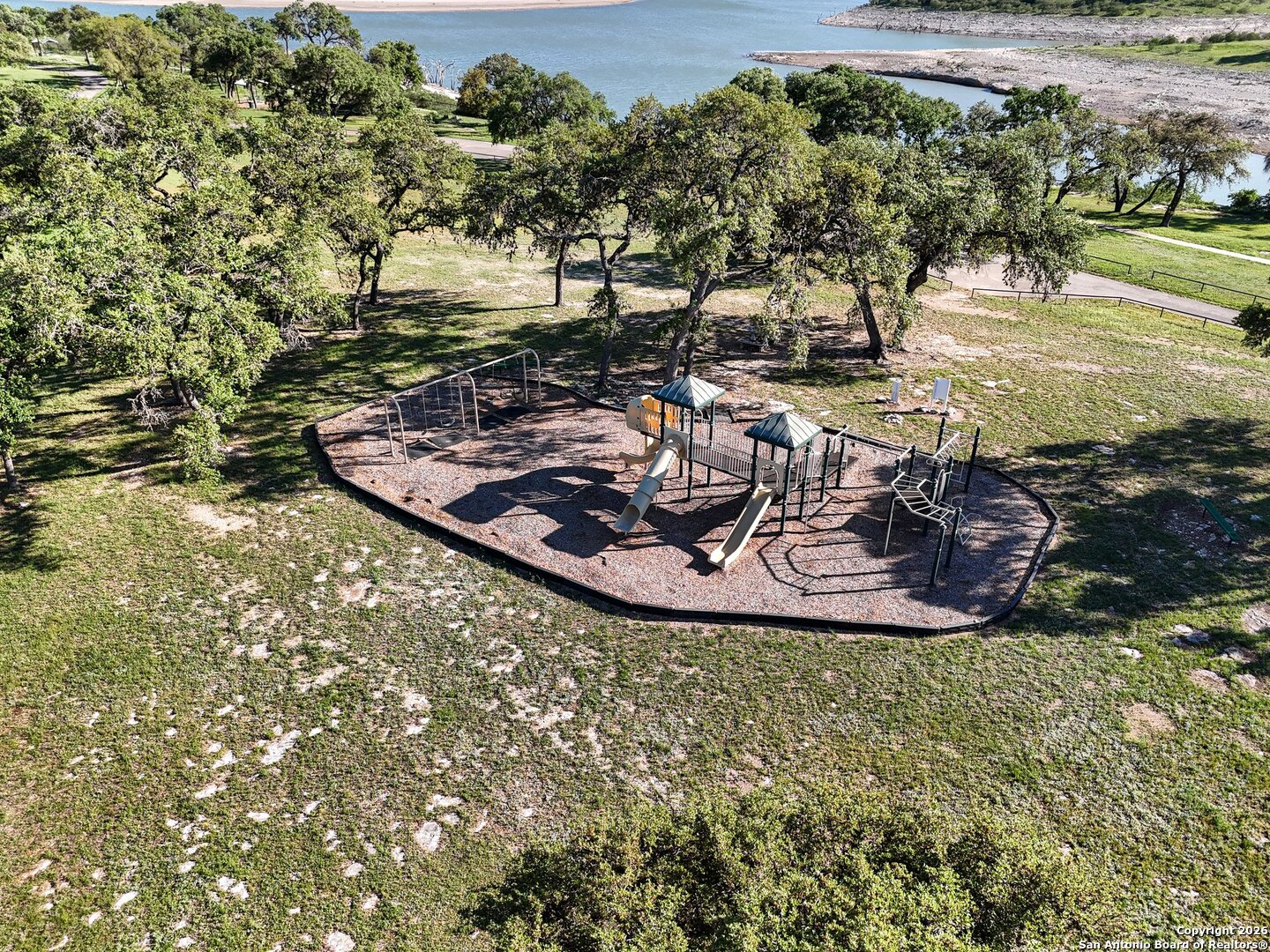 335 Arthur Court Spring Branch, TX 78070 - Photo 18 of 18 a view of a water with a large trees
