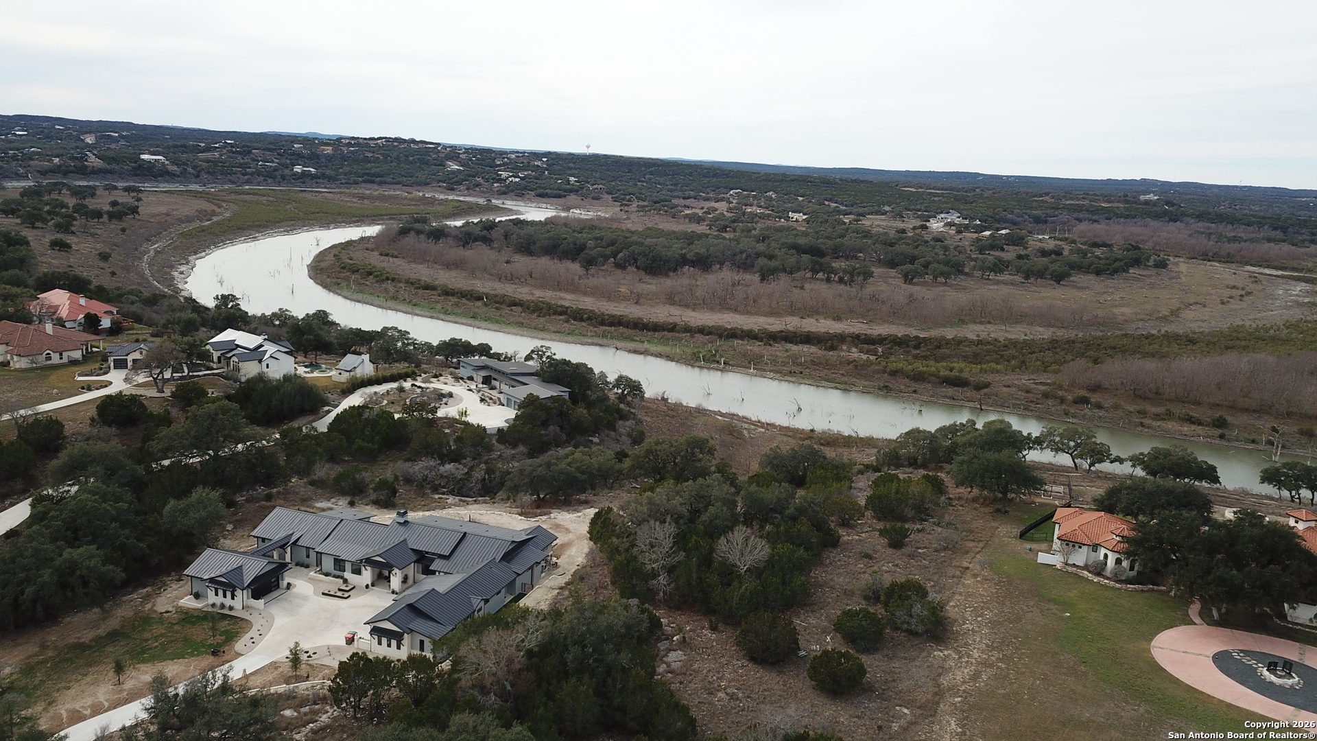 335 Arthur Court Spring Branch, TX 78070 - Photo 6 of 18 a view of a lake with a mountain