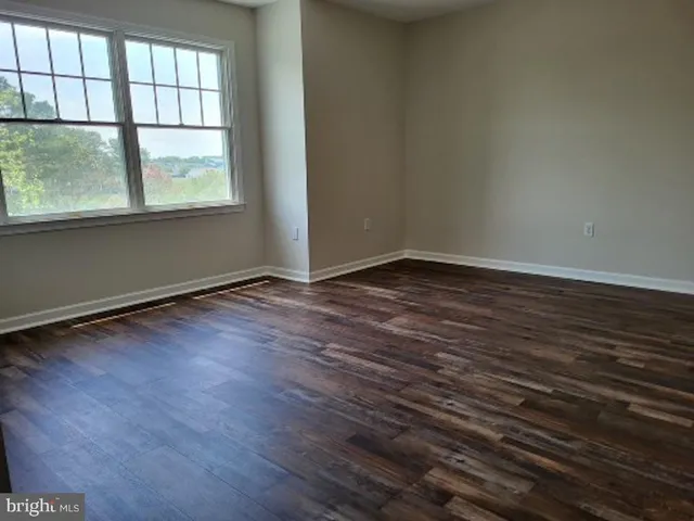 a view of a lake with a big yard