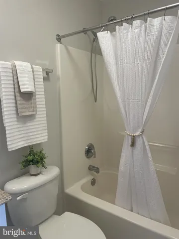 an aerial view of a house with a lake view