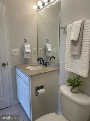 an aerial view of a house with a lake view