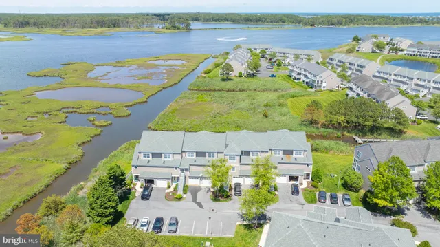a view of a lake with a yard