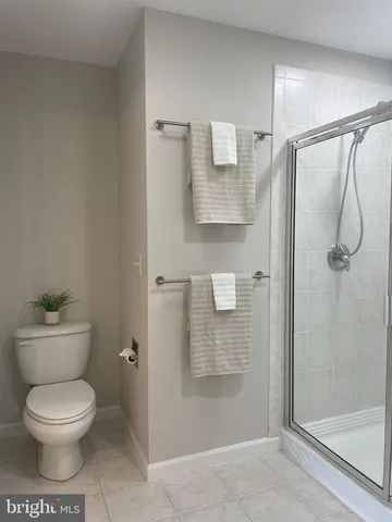 a view of a pathway with a garden