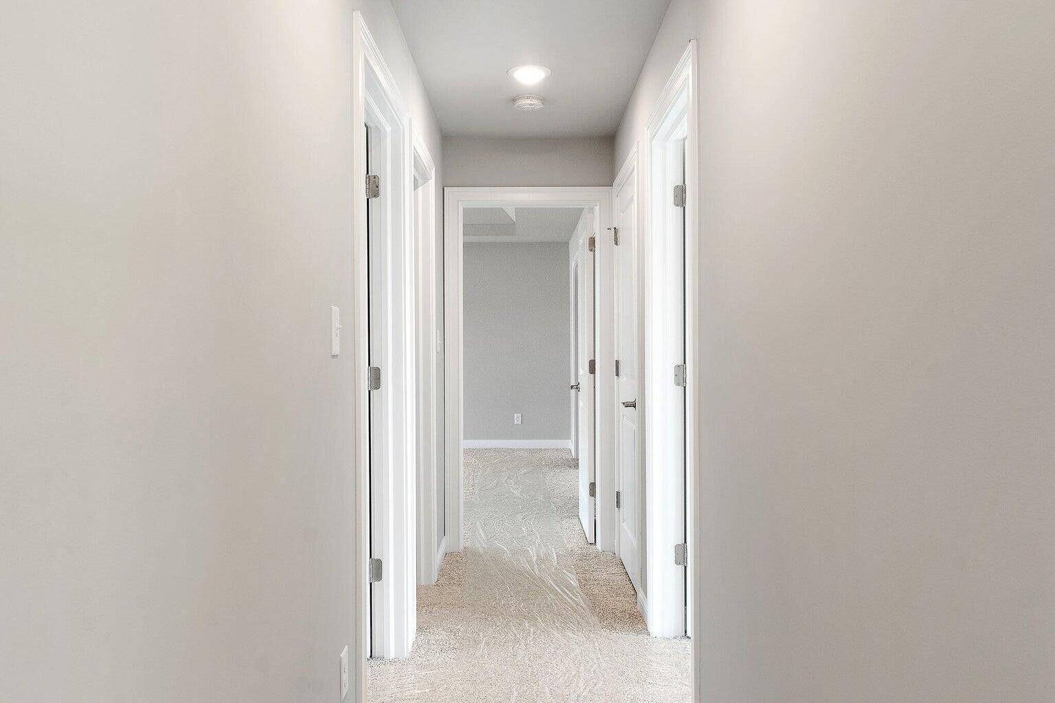 3090 West 105th Avenue Crown Point, IN 46307 - Photo 13 of 22 a view of a bathroom from a hallway