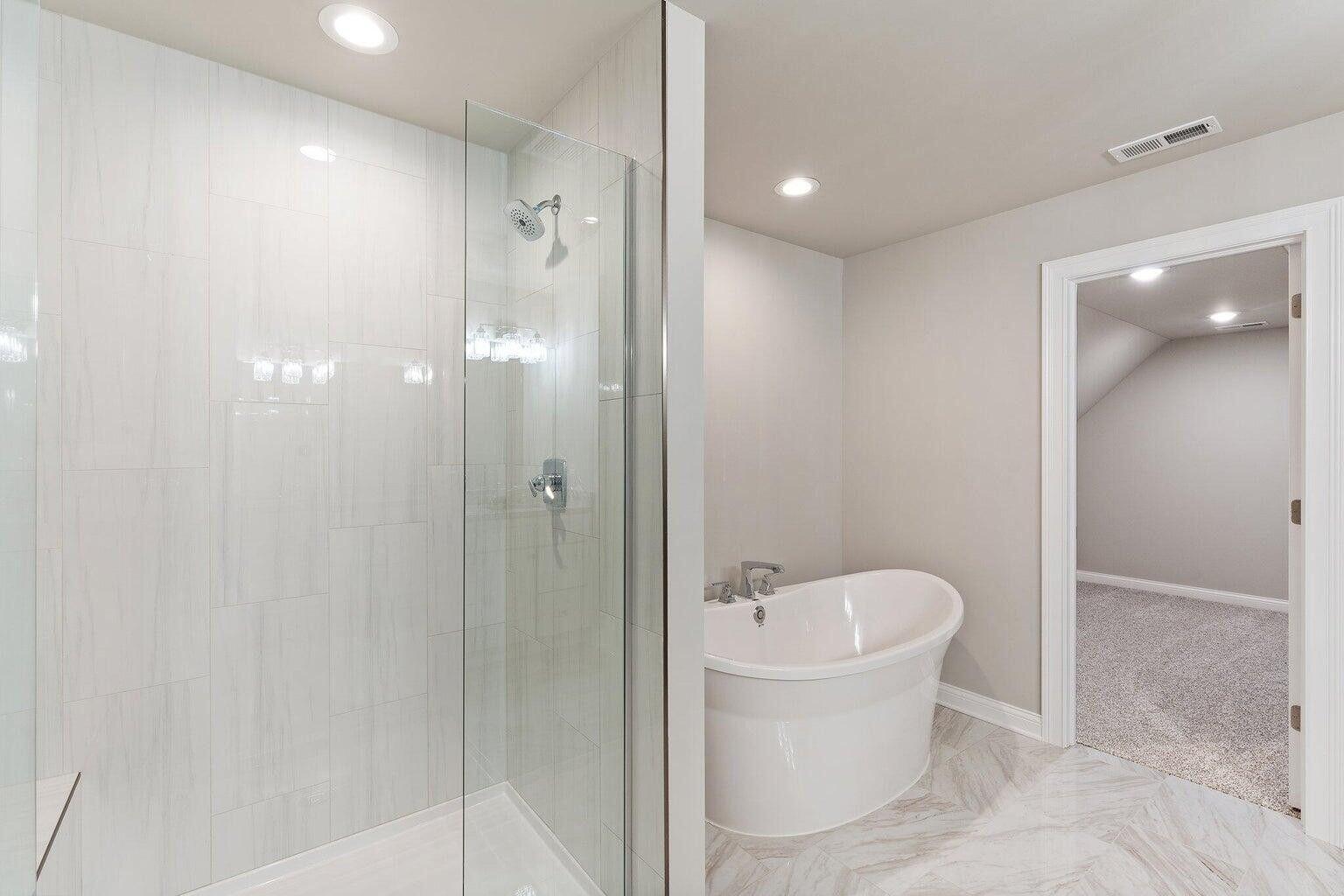 3090 West 105th Avenue Crown Point, IN 46307 - Photo 18 of 22 a bathroom with a toilet and shower
