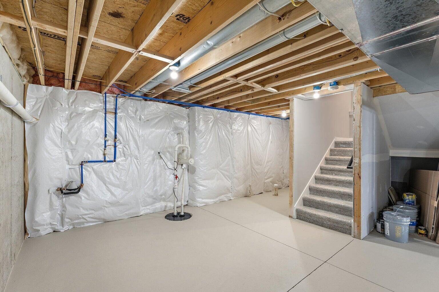 3090 West 105th Avenue Crown Point, IN 46307 - Photo 21 of 22 a view of a room with stairs and a wooden floor