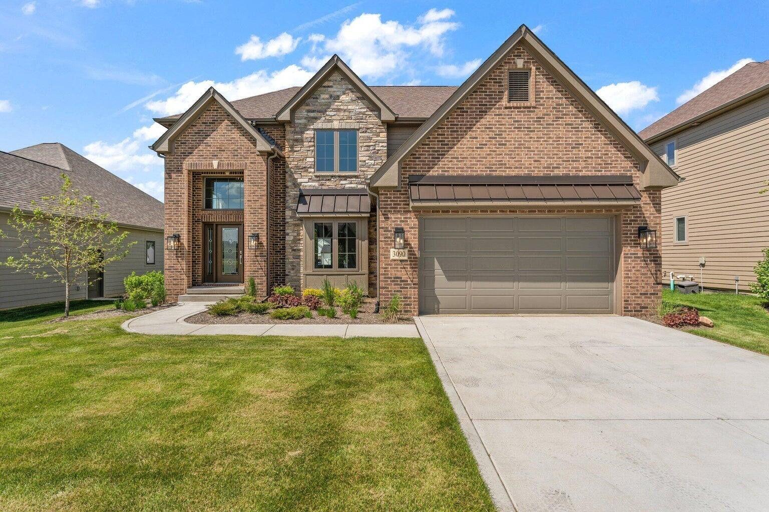 3090 West 105th Avenue Crown Point, IN 46307 - Photo 22 of 22 a front view of a house with swimming pool