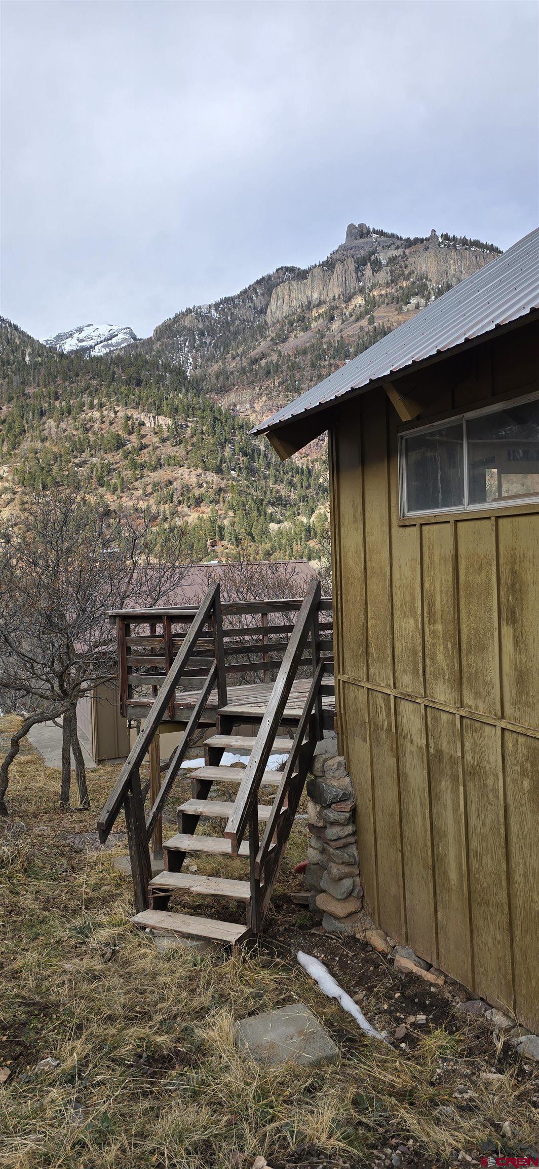 206 4th Street Ouray, CO 81427 - Photo 13 of 18 a view of a terrace with wooden floor and a mountain view
