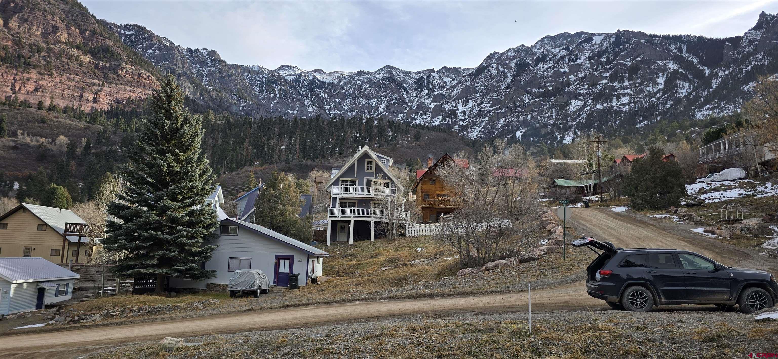 206 4th Street Ouray, CO 81427 - Photo 15 of 18 a car parked on the side of the road
