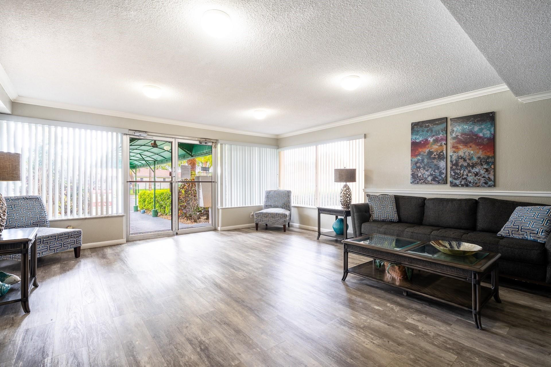 22605 Southwest 66th Avenue, Unit 102 Boca Raton, FL 33428 - Photo 15 of 27 Locked lobby with electronic all box.