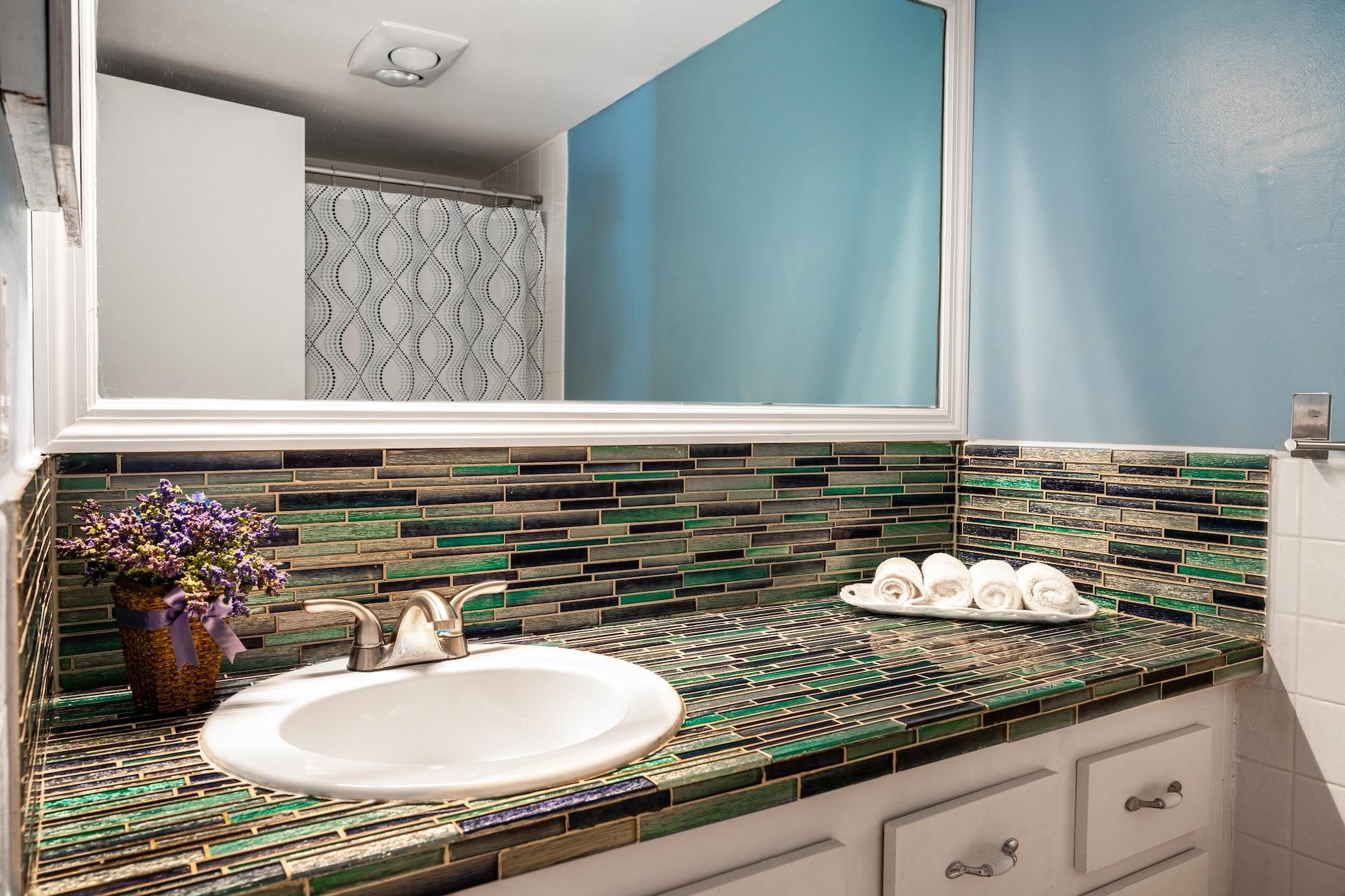 22605 Southwest 66th Avenue, Unit 102 Boca Raton, FL 33428 - Photo 10 of 27 Main Bathroom has tub-shower combo.