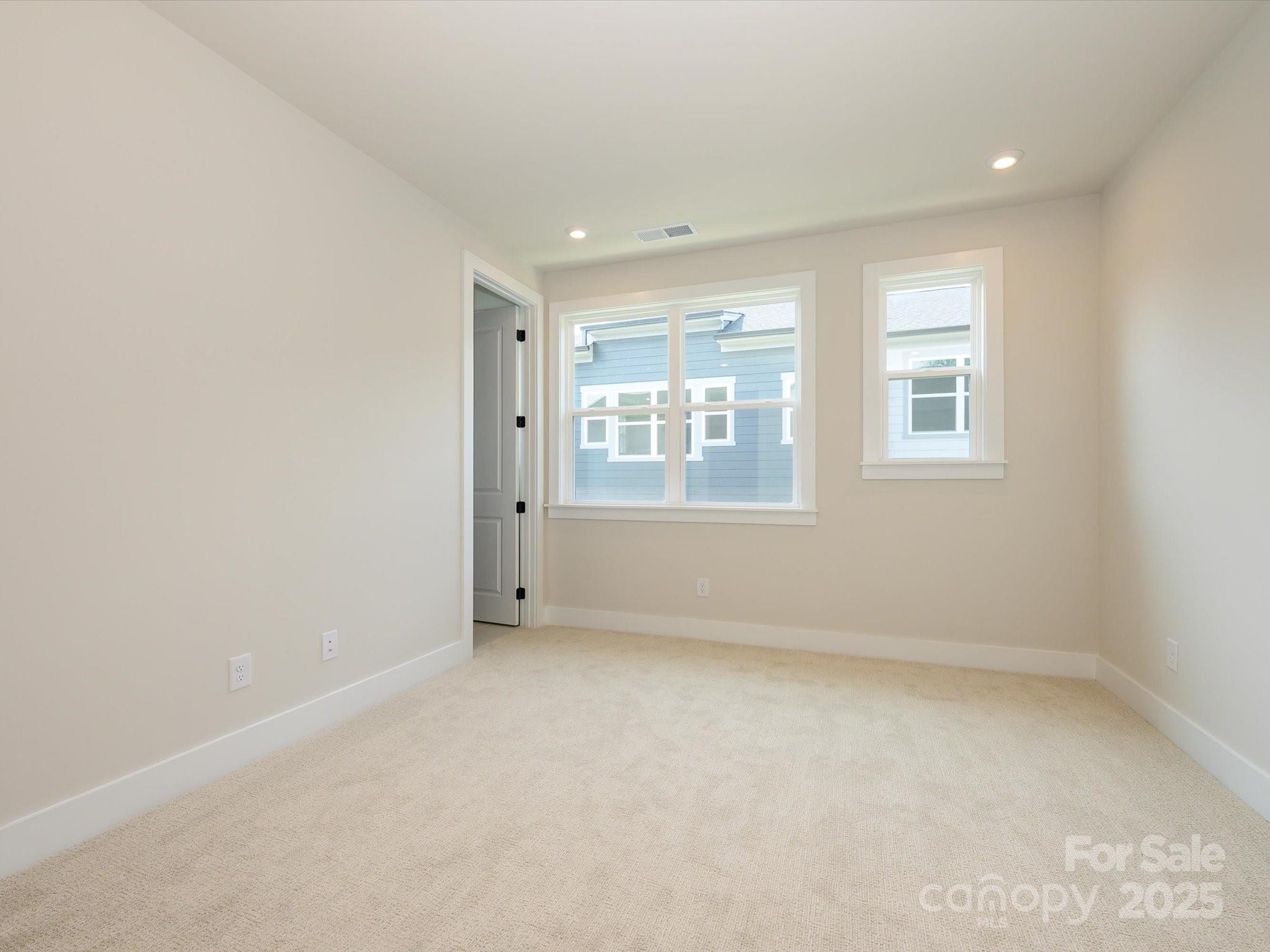 6009 Pivot Court Charlotte, NC 28205 - Photo 8 of 16 an empty room with a window