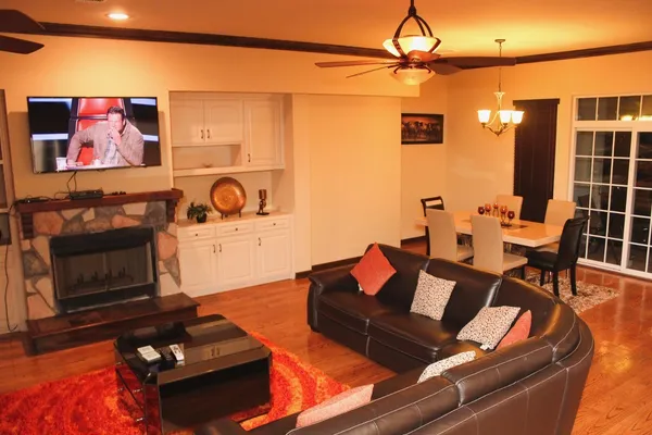 a living room with furniture and a flat screen tv