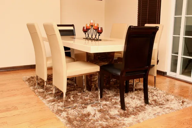a view of a dining room with furniture