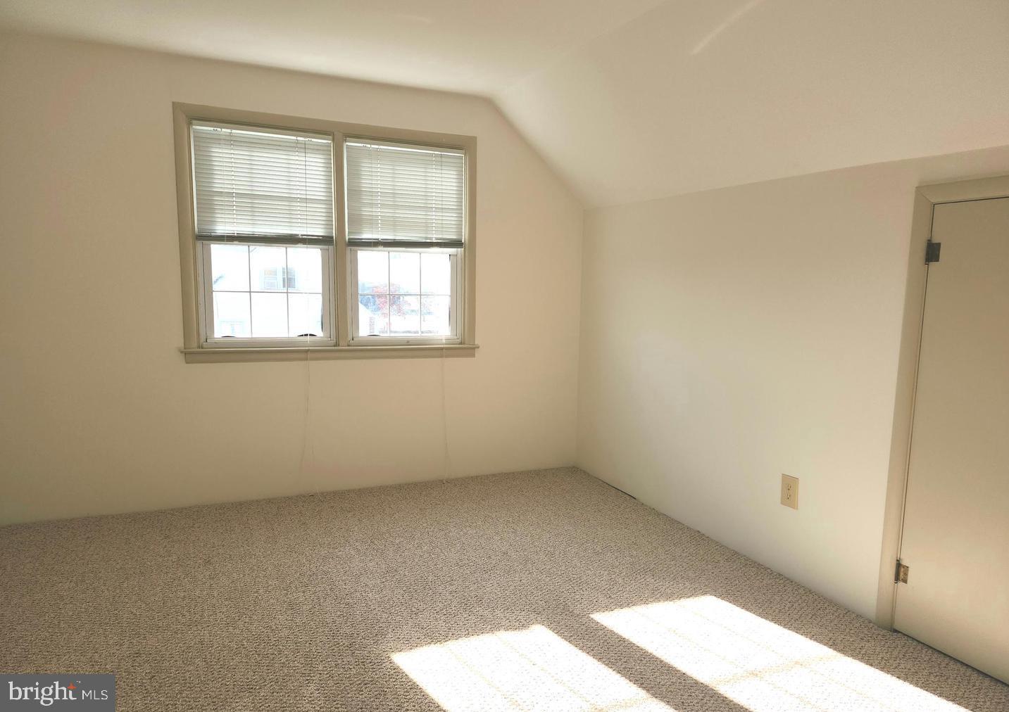 22 Wayne Avenue Trooper, PA 19403 - Photo 4 of 13 an empty room with a window