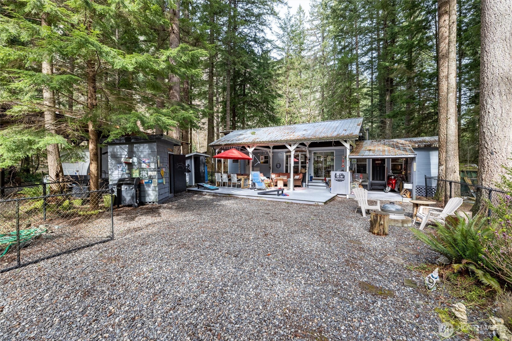1075 Birch Lane Maple Falls, WA 98266 - Photo 15 of 16 front view of a house with a yard and an trees