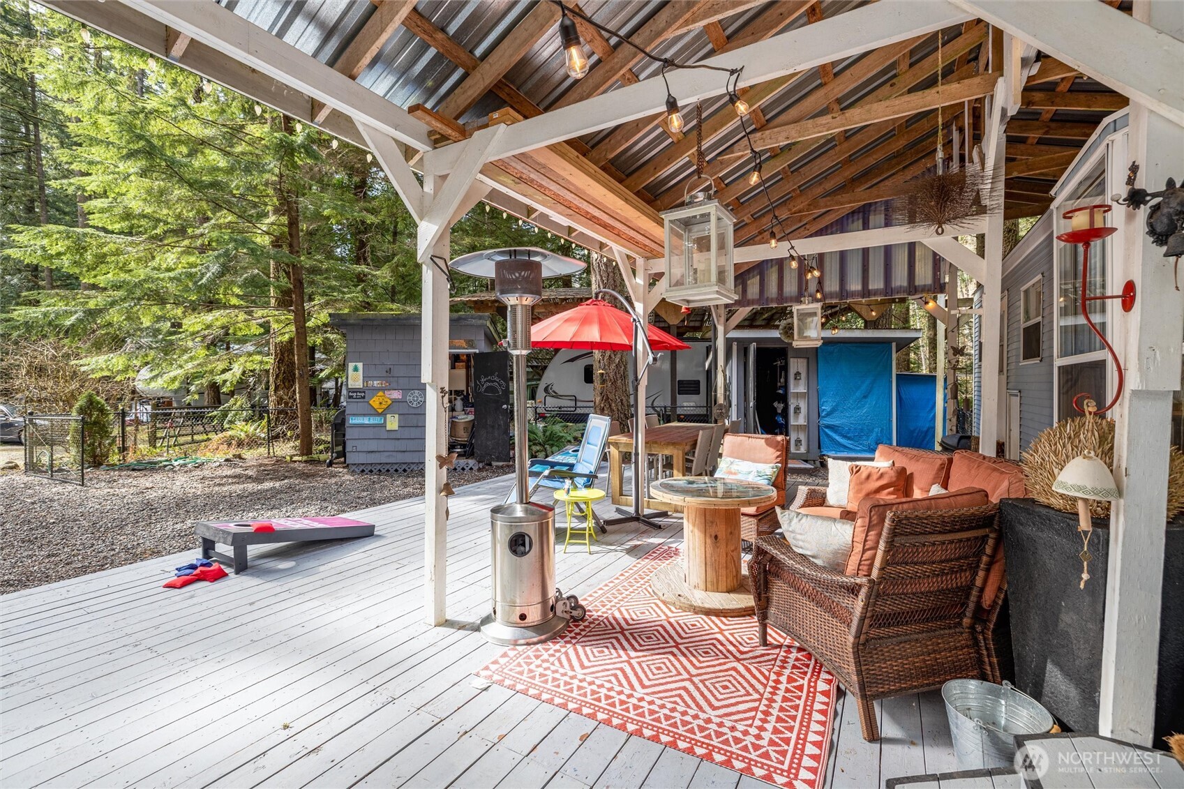 1075 Birch Lane Maple Falls, WA 98266 - Photo 2 of 16 a building outdoor space with patio furniture and potted plants