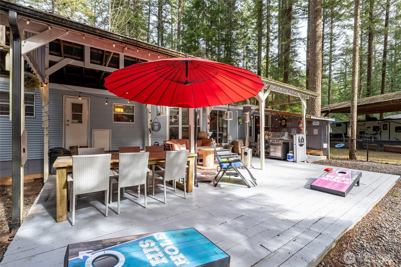1075 Birch Lane Maple Falls, WA 98266 - Photo 3 of 16 a view of a dinning table and chairs in the patio