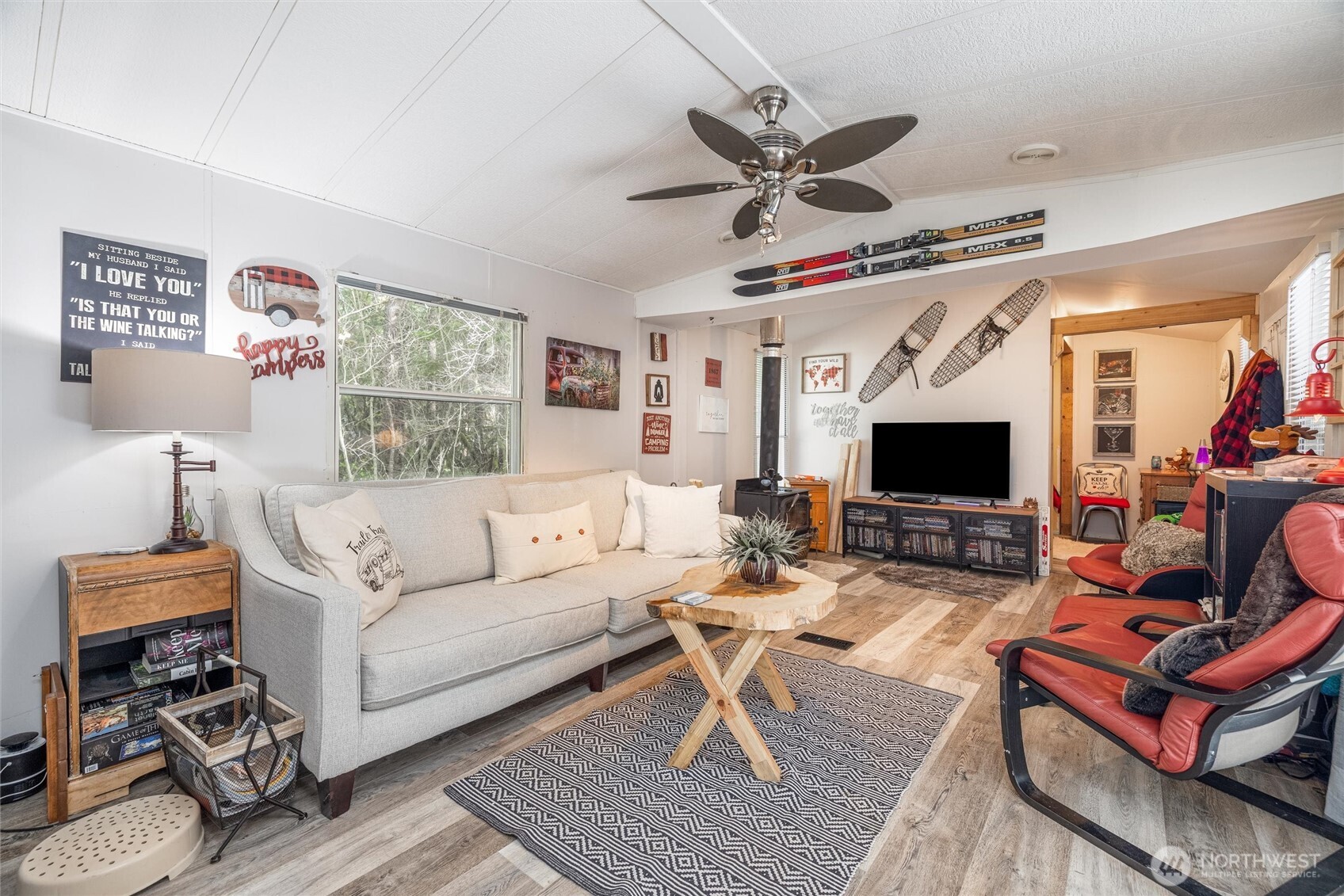1075 Birch Lane Maple Falls, WA 98266 - Photo 7 of 16 a living room with furniture a flat screen tv and a window