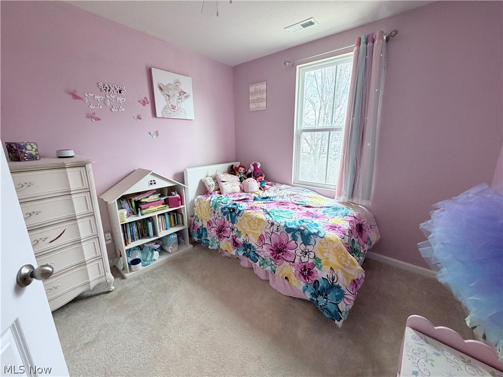 177 Raintree Lane Painesville, OH 44077 - Photo 30 of 40 Bedroom featuring light colored carpet and baseboards