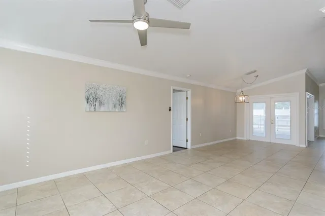 a large kitchen with stainless steel appliances granite countertop a large stove top oven a sink and dishwasher