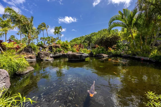 a view of a chairs and table in a patio